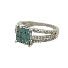 Load image into Gallery viewer, Add a striking pop of colour to your collection with this pre-owned 9ct white gold and diamond set square cluster ring, blending bold design with refined elegance, featuring:

Design: A standout square cluster formation, showcasing nine princess cut blue coloured diamonds set closely together for a seamless, vivid centrepiece.
Material: Crafted in 9-carat white gold, offering a sleek, contemporary finish that complements the vibrant stones.
