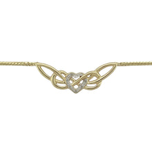 Load image into Gallery viewer, Celebrate love and heritage with this pre-owned 9ct yellow and white gold diamond set Celtic heart necklace, blending timeless symbolism with refined sparkle, featuring:

Design: A beautifully crafted Celtic heart motif, symbolising eternal love and unity, with intricate openwork and diamond accents for a graceful finish.
Material: Made from 9-carat yellow and white gold, offering a soft contrast that enhances the depth and detail of the design.
