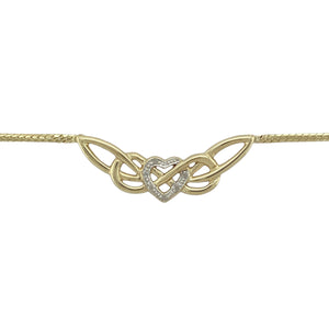 Celebrate love and heritage with this pre-owned 9ct yellow and white gold diamond set Celtic heart necklace, blending timeless symbolism with refined sparkle, featuring:

Design: A beautifully crafted Celtic heart motif, symbolising eternal love and unity, with intricate openwork and diamond accents for a graceful finish.
Material: Made from 9-carat yellow and white gold, offering a soft contrast that enhances the depth and detail of the design.