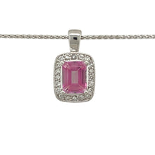 Load image into Gallery viewer, Add a soft pop of colour and refined sparkle to your jewellery collection with this pre-owned 9ct white gold diamond and pink sapphire set pendant necklace, offering timeless elegance with a feminine twist, featuring:

Design: A sophisticated rectangular pendant design, centred around a striking pink sapphire and framed with a halo of glittering diamonds for maximum brilliance.
Material: Crafted in 9-carat white gold, offering a sleek and polished finish that enhances the vivid tones of the sapphire
