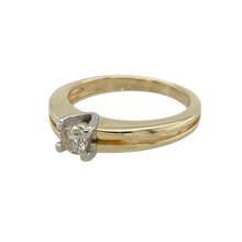 Load image into Gallery viewer, Add a contemporary twist to a classic design with this pre-owned 9ct yellow gold and diamond set split band solitaire ring, combining timeless sparkle with modern elegance, featuring:

Design: A solitaire ring with a sleek split band design, drawing the eye to a brilliant-cut diamond at the centre, offering a refined yet modern silhouette.
Material: Made from 9-carat yellow gold, the polished finish adds warmth and enhances the elegant lines of the split band.
