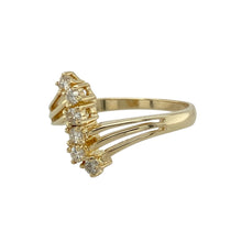 Load image into Gallery viewer, Add a modern sparkle to your jewellery collection with this pre-owned 9ct yellow gold diamond set split band ring, blending graceful curves with timeless brilliance, featuring:

Design: A split band ring with a contemporary twist, featuring six brilliant-cut diamonds set in a gentle squiggle line across the front for a playful yet elegant look.
Material: Made from 9-carat yellow gold, the polished finish complements the flowing design and enhances the sparkle of the diamonds.

