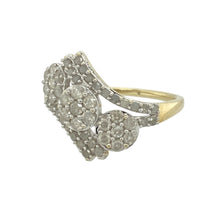 Load image into Gallery viewer, Add a flourish of sparkle and floral elegance to your collection with this pre-owned 9ct yellow gold diamond set triple flower cluster ring, combining graceful curves with brilliant detail, featuring:

Design: A striking triple flower cluster design, each bloom formed by a cluster of diamonds, arranged across the front of the ring on a gently twisted wrap-over band for a dynamic and flowing silhouette.
Material: Made from 9-carat yellow gold, the polished finish enhances the ring’s warm tone
