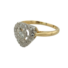 Load image into Gallery viewer, Celebrate love and sparkle with this pre-owned 18ct yellow gold diamond set heart ring, a beautifully symbolic piece that blends timeless sentiment with refined elegance, featuring:

Design: A romantic heart-shaped motif sits at the centre of this elegant ring, adorned with diamonds for added brilliance, and framed by a smooth gold band for a classic finish.
Material: Made from luxurious 18-carat yellow gold, the polished finish enhances the warm tone and complements the sparkle of the diamonds.

