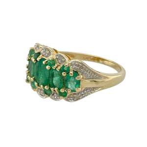 Add timeless elegance and vibrant colour to your collection with this pre-owned 9ct yellow gold diamond and emerald set cluster dress ring, offering classic style with a luxurious touch, featuring:

Design: A cluster setting with vivid emeralds at the centre, framed by a halo of sparkling diamonds that enhance the stone’s rich green hue and add brilliant contrast.
Material: Crafted from 9-carat yellow gold, the polished finish complements the deep tones of the emerald and the bright sparkle of the diamonds.