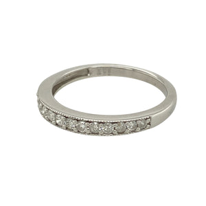Add refined sparkle to your collection with this pre-owned 9ct white gold diamond set band ring, offering timeless elegance and subtle brilliance, perfect for stacking or wearing solo:

Design: A classic band style with a clean, polished profile, set with shimmering diamonds across the front for a touch of understated luxury.
Material: Made from 9-carat white gold, the sleek finish enhances the brilliance of the diamonds and gives the ring a contemporary edge.
