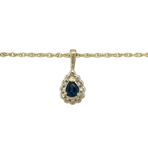 Add timeless elegance and rich colour to your jewellery collection with this pre-owned 9ct yellow gold diamond and sapphire set cluster pendant necklace, offering a refined and radiant design perfect for everyday luxury or special occasions:

Design: A traditional cluster pendant featuring a deep blue oval sapphire surrounded by a halo of sparkling diamonds, creating a graceful floral-inspired silhouette.