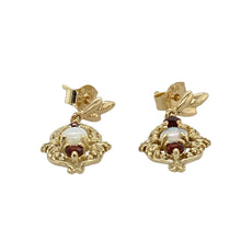 Load image into Gallery viewer, Bring vintage-inspired charm to your collection with these pre-owned 9ct yellow gold opalique and garnet set fancy drop earrings, offering soft colour contrast and elegant movement—perfect for special occasions or refined everyday wear.

Design: Each earring features a round 4mm opalique stone at the centre, accented by rich garnet details in a delicate drop setting that adds graceful length and vintage flair.


