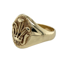 Load image into Gallery viewer, Bring proud heritage and bold style to your collection with this pre-owned 9ct yellow gold Welsh Three Feathers oval signet ring, offering strong design and meaningful symbolism—perfect for everyday wear or standout occasions.

Design: The ring features the iconic Welsh Three Feathers emblem on an oval face, symbolising loyalty and tradition with a distinctive national touch.
Material: Made from 9-carat yellow gold, the polished finish enhances the engraved detail and adds a rich, refined glow.
