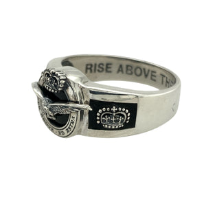 Bring heritage and honour to your collection with this pre-owned 925 silver and onyx set RAF 90th Anniversary ring, commemorating a proud legacy with striking detail and meaningful inscriptions—perfect for collectors or those with a connection to the Royal Air Force.

Design: The front of the ring features a deep black onyx stone set with a central bird emblem and crown, framed by the Latin motto Per Ardua Ad Astra—"Through adversity to the stars."