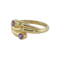 Load image into Gallery viewer, Bring vibrant elegance to your collection with this pre-owned 9ct yellow gold and amethyst set twist ring, offering graceful movement and rich colour—perfect for everyday style or a thoughtful gift.

Design: The ring features a delicate twist design set with two round amethyst stones, each 3mm in diameter, creating a balanced and eye-catching look with a touch of purple sparkle.
Material: Made from 9-carat yellow gold, the polished finish enhances the warmth of the gold
