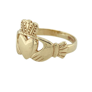 Bring heartfelt tradition to your collection with this pre-owned 9ct yellow gold Claddagh ring, symbolising love, loyalty, and friendship in a timeless Irish design—perfect for meaningful gifting or everyday wear.

Design: The ring features the iconic Claddagh motif with two hands holding a crowned heart, representing enduring emotional bonds and heritage.
Material: Made from 9-carat yellow gold, the polished finish enhances the rich tone and brings out the fine detailing of the symbolic design.
