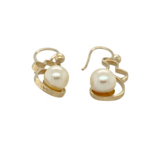 Load image into Gallery viewer, Bring timeless elegance to your collection with these pre-owned 9ct yellow gold and pearl fancy drop earrings, offering graceful movement and classic beauty—perfect for special occasions or refined everyday wear.

Design: Each earring features a 6mm round pearl suspended in a decorative drop setting, blending soft lustre with a flowing, elegant silhouette.
Material: Made from 9-carat yellow gold, the polished finish enhances the warm tone of the gold and beautifully complements the natural glow of the pearl
