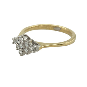 Bring classic sparkle and timeless charm to your collection with this pre-owned 18ct yellow gold diamond set cluster ring, offering elegant brilliance in a refined vintage-inspired design—perfect for special occasions or everyday sophistication.

Design: The ring features a traditional cluster arrangement with round brilliant-cut diamonds totalling approximately 0.13 carats, creating a floral-inspired design that catches the light from every angle.
