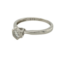 Load image into Gallery viewer, Bring timeless elegance to your collection with this pre-owned 9ct white gold diamond illusion set solitaire ring, offering classic style with enhanced sparkle—perfect for special occasions, proposals, or refined everyday wear.

Design: The ring features a brilliant-cut diamond of approximately 0.25 carats set in an illusion-style setting, creating the look of a larger stone while maximising sparkle.
Material: Made from 9-carat white gold
