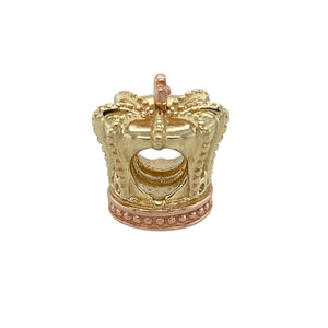 Bring regal elegance and symbolic charm to your collection with this pre-owned 9ct yellow and rose gold Clogau crown bead charm, celebrating heritage, strength, and timeless style—perfect for meaningful gifting or personal keepsakes.

Design: The charm is shaped as a detailed crown, blending classic royal symbolism with Clogau’s distinctive dual-tone gold design for a striking and elegant finish.
