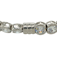 Load image into Gallery viewer, Bring elegant sparkle and timeless design to your collection with this pre-owned 925 silver and cubic zirconia set 7.5&quot; bracelet, offering classic glamour with practical detailing—perfect for special occasions or refined everyday wear.

Design: The bracelet features a series of 5mm round cubic zirconia stones, each set in polished silver for maximum brilliance and clean symmetry.

