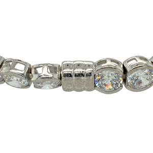 Bring elegant sparkle and timeless design to your collection with this pre-owned 925 silver and cubic zirconia set 7.5" bracelet, offering classic glamour with practical detailing—perfect for special occasions or refined everyday wear.

Design: The bracelet features a series of 5mm round cubic zirconia stones, each set in polished silver for maximum brilliance and clean symmetry.
