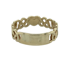 Load image into Gallery viewer, Bring symbolic charm and timeless craftsmanship to your collection with this pre-owned 9ct yellow gold Celtic heart band ring, featuring a meaningful design and bold profile—perfect for everyday wear or heartfelt gifting.

Design: The band showcases an intricate Celtic heart motif, symbolising eternal love and unity, set in a continuous pattern around the band.
Material: Made from 9-carat yellow gold, the polished finish enhances the warm tone of the gold and highlights the detailed engraving.


