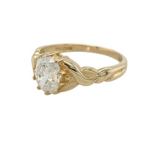 Load image into Gallery viewer, Bring graceful sparkle and elegant detail to your collection with this pre-owned 14ct yellow gold cubic zirconia set ring, featuring a classic centre stone with a modern twist—perfect for everyday style or special occasion wear.

Design: The ring showcases an 8mm by 6mm oval-cut cubic zirconia at the centre, with softly twisted shoulders that add movement and a contemporary touch to the classic setting.
