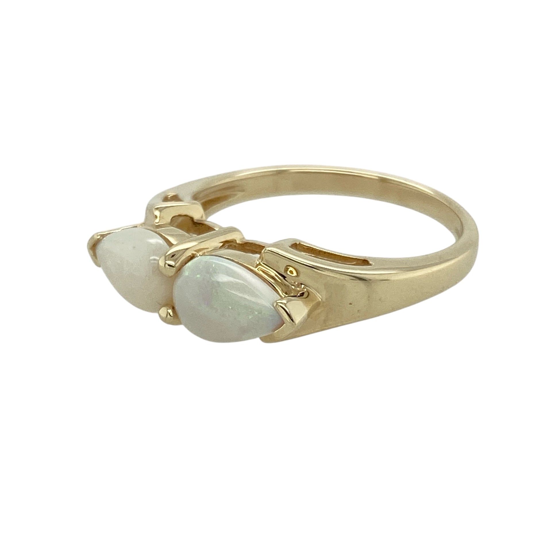Bring luminous colour and graceful symmetry to your collection with this pre-owned 9ct yellow gold double pear-shaped opalique set ring, offering soft iridescence and elegant design—perfect for everyday style or meaningful gifting.

Design: The ring features two 8mm by 5mm pear-shaped opalique stones set side by side in a mirrored arrangement, creating a balanced and eye-catching silhouette with glowing play-of-colour.
