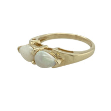 Load image into Gallery viewer, Bring luminous colour and graceful symmetry to your collection with this pre-owned 9ct yellow gold double pear-shaped opalique set ring, offering soft iridescence and elegant design—perfect for everyday style or meaningful gifting.

Design: The ring features two 8mm by 5mm pear-shaped opalique stones set side by side in a mirrored arrangement, creating a balanced and eye-catching silhouette with glowing play-of-colour.

