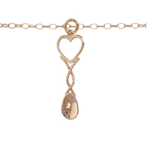 Bring heartfelt tradition and Welsh heritage to your collection with this pre-owned 9ct rose Welsh gold heart lovespoon pendant on an 18" belcher chain, combining cultural symbolism with elegant craftsmanship—perfect for meaningful gifting or everyday sentiment.

Design: The pendant features a traditional lovespoon design with an open heart motif, symbolising love and affection, measuring 4.1cm long including the bail.
