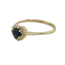 Load image into Gallery viewer, Celebrate timeless romance and sparkle with this pre-owned 9ct yellow gold diamond and sapphire heart cluster ring—a delicate design full of charm and sentiment.

Design: At the centre sits a 5mm heart-shaped sapphire, encircled by a halo of glittering diamonds that enhance its rich blue tone and create a striking cluster effect.
Material: Made from 9-carat yellow gold, the soft golden finish pairs beautifully with the deep sapphire hue and the bright sparkle of the surrounding diamonds.

