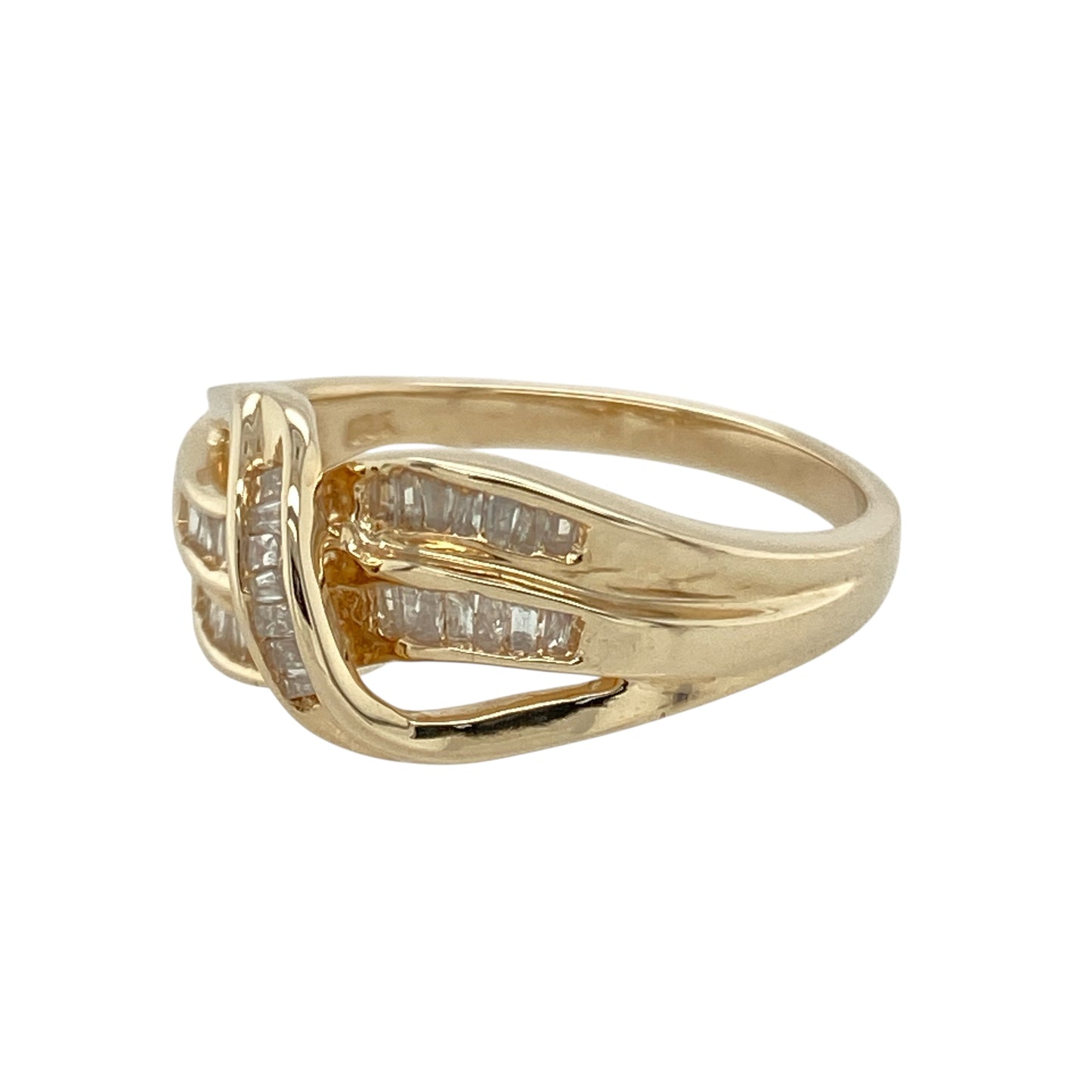 Add bold brilliance and sculptural elegance to your jewellery collection with this pre-owned 18ct yellow gold diamond wrap-over band ring—designed to stand out with style and sparkle.

Design: The ring features a split three-row wrap-over design, rising to 9mm at the front and set with baguette-cut diamonds that create a sleek, structured look.
Material: Made from 18-carat yellow gold, the rich finish enhances the clean lines and reflective facets of the baguette diamonds.
