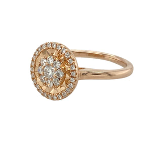 Make a sparkling statement with this pre-owned 18ct rose gold diamond cluster halo ring—an eye-catching design full of detail, radiance, and romantic charm.

Design: At the centre is a brilliant cluster of diamonds, framed by a starburst-style surround and an additional outer halo of diamonds. The layered design creates a dazzling depth and intricate finish, with the front of the ring measuring 10mm high.
