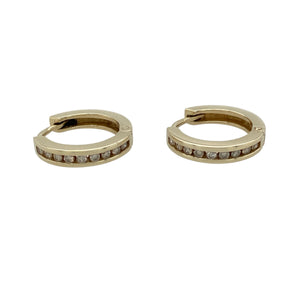 Bring effortless elegance and everyday sparkle to your collection with these pre-owned 9ct gold diamond set hoop earrings—a timeless style with refined brilliance.

Design: These classic hoops are adorned with diamond accents along the front, adding light-catching detail to a sleek and versatile shape.
Material: Made from 9-carat gold, the warm tone enhances the natural sparkle of the diamonds for a polished and radiant finish.