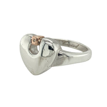Load image into Gallery viewer, Celebrate love and Welsh heritage with this pre-owned 925 silver and 9ct rose gold Clogau diamond heart ring—a romantic and meaningful design with timeless charm.

Design: The ring features a beautifully shaped heart at the centre, measuring 11mm high, accented with delicate diamond detailing for added sparkle and elegance.
Material: Crafted from sterling silver with 9-carat rose gold highlights, the mixed-metal design offers a warm and graceful contrast that enhances the heart motif.

