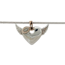 Load image into Gallery viewer, Bring a touch of grace and gentle sparkle to your collection with this pre-owned 925 silver and 9ct rose gold Clogau Angel Heart pendant necklace—an elegant blend of sentiment, beauty, and subtle brilliance.

Design: The pendant features a delicate heart shape with angelic wing-inspired detailing in 9ct rose gold. Measuring 1.6cm long including the bail, it includes a small diamond set within the bail for a touch of refined sparkle.

