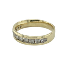 Load image into Gallery viewer, Add refined sparkle and classic style to your collection with this pre-owned 9ct yellow gold diamond band ring—a timeless design with elegant brilliance.

Design: The band measures 4mm wide at the front and features a row of sparkling diamonds set across the top for a sleek, polished look.
Material: Made from 9-carat yellow gold, the warm tone enhances the brilliance of the diamonds and offers a traditional, luxurious finish.

