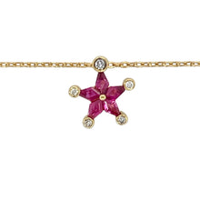 Load image into Gallery viewer, Bring celestial charm and rich colour to your collection with this pre-owned 18ct yellow gold diamond and ruby star pendant necklace—a radiant piece full of sparkle and symbolism.

Design: The 1.2cm long star-shaped pendant features five vibrant ruby stones, with a brilliant diamond set at the tip of each star point for added brilliance and definition.
Material: Made from 18-carat yellow gold, the warm setting enhances the deep red of the rubies
