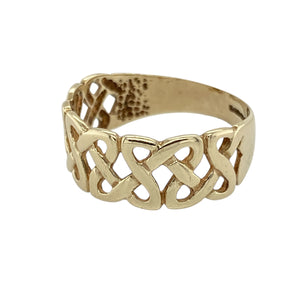 Celebrate heritage and timeless design with this pre-owned 9ct yellow gold Celtic knot band ring—a meaningful symbol of unity and eternity, crafted in elegant detail.

Design: The band features an intricate Celtic knot pattern across the front, measuring 8mm wide, with interwoven lines symbolising eternal love, loyalty, and interconnectedness.
Material: Made from 9-carat yellow gold, the warm finish enhances the traditional motif while offering a classic and enduring look.
