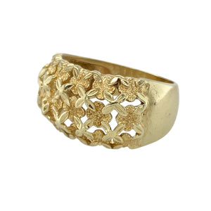 Bring vintage charm and intricate detail to your collection with this pre-owned 9ct yellow gold flower style patterned wide band ring—a bold yet graceful design full of character.

Design: The band features an ornate floral-inspired pattern across the front, with delicate openwork and textured detailing. Measuring 12mm wide, it offers a standout, lace-like appearance.
Material: Made from 9-carat yellow gold, the warm tone enhances the intricate design and provides a timeless, elegant finish.
