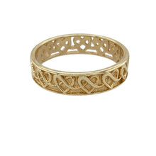 Load image into Gallery viewer, Celebrate love and heritage with this pre-owned 9ct yellow gold Celtic heart band ring—rich in symbolism, timeless in style. The inside of the band says &#39;You to me are more precious than a heart of gold&#39;.

Design: This 5mm wide band features an elegant repeating Celtic heart pattern, symbolising eternal love and unity through its interwoven design.
Material: Made from 9-carat yellow gold, the warm, polished finish highlights the intricate details and adds a classic glow.

