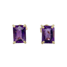 Load image into Gallery viewer, Add a pop of rich colour and classic elegance to your collection with these pre-owned 9ct yellow gold amethyst set rectangle stud earrings—refined, vibrant, and timeless.

Design: Each earring features a 7mm by 5mm rectangular-cut amethyst in a sleek four-claw setting, offering a clean, elegant silhouette with a bold splash of purple.
Material: Made from 9-carat yellow gold, the warm tone beautifully complements the deep, vivid hue of the amethyst stones.

