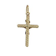 Load image into Gallery viewer, Express your faith with timeless style in this pre-owned 9ct yellow gold twisted crucifix pendant—a meaningful design with a unique, elegant twist.

Design: This pendant features a traditional crucifix with gently twisted arms, adding dimension and a distinctive touch to the classic form.
Material: Made from 9-carat yellow gold, the polished finish brings warmth and shine, enhancing the sculpted detail throughout the design.
Pendant Detail: The twisted design offers a refined take on a sacred symbol
