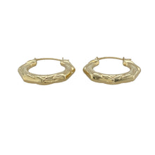 Load image into Gallery viewer, Add charm and character to your everyday look with these pre-owned 9ct yellow gold six-sided patterned creole earrings—sweetly detailed and effortlessly stylish.

Design: Each earring features a six-sided angular creole shape with intricate patterning and a delicate heart accent at the bottom, adding a touch of playful elegance.
Material: Made from 9-carat yellow gold, the polished finish enhances both the geometric form and the subtle heart detail for a warm, timeless glow.

