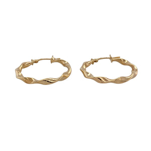 Add classic texture and golden shine to your everyday style with these pre-owned 9ct yellow gold twisted hoop creole earrings—timeless, lightweight, and effortlessly elegant.

Design: These hoop earrings feature a gently twisted design, giving a dynamic look with added depth and movement in a traditional creole shape.
Material: Made from 9-carat yellow gold, the polished finish highlights the twist pattern and adds a warm, radiant glow.

