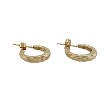 Load image into Gallery viewer, Add timeless detail and subtle shine to your look with these pre-owned 9ct yellow gold patterned small half hoop stud earrings—classic, versatile, and effortlessly elegant.

Design: These earrings feature a small half hoop shape with intricate patterning, blending the style of a hoop with the ease of a stud for a refined, everyday accessory.
Material: Made from 9-carat yellow gold, the polished finish enhances the decorative detailing and provides a warm, classic glow.

