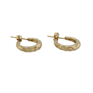 Add timeless detail and subtle shine to your look with these pre-owned 9ct yellow gold patterned small half hoop stud earrings—classic, versatile, and effortlessly elegant.

Design: These earrings feature a small half hoop shape with intricate patterning, blending the style of a hoop with the ease of a stud for a refined, everyday accessory.
Material: Made from 9-carat yellow gold, the polished finish enhances the decorative detailing and provides a warm, classic glow.
