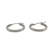 Load image into Gallery viewer, Add sleek sophistication to your jewellery collection with these pre-owned 9ct white gold plain hoop creole earrings—minimalist, versatile, and effortlessly chic.

Design: These classic creole-style hoops feature a smooth, polished surface and clean curved silhouette for a timeless and understated look.
Material: Made from 9-carat white gold, the cool-toned finish offers a modern alternative to yellow gold with a refined, contemporary feel.

