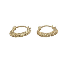 Load image into Gallery viewer, Add a touch of detail and classic shine to your look with these pre-owned 9ct yellow gold patterned small creole earrings—delicate, elegant, and easy to wear.

Design: These small creole-style earrings feature subtle engraved patterning along the surface, offering texture and vintage-inspired charm in a compact design.
Material: Made from 9-carat yellow gold, the polished finish enhances the intricate detailing and provides a warm, timeless glow.

