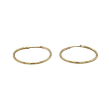 Load image into Gallery viewer, Keep it simple and stylish with these pre-owned 9ct yellow gold plain hoop earrings—delicate, lightweight, and effortlessly versatile.

Design: These classic hoop earrings feature a smooth, polished finish and minimalist round shape, offering timeless appeal in a subtle size.
Material: Made from 9-carat yellow gold, the bright, warm tone adds a touch of everyday elegance.

