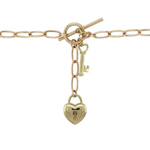 Load image into Gallery viewer, Add romantic charm and vintage style to your collection with this pre-owned 9ct yellow and rose gold open link curb chain—elegant, meaningful, and beautifully detailed.

Design: This 18&quot; chain features alternating open curb links with a 4mm width, finished with a classic heart-shaped padlock and matching key for a timeless touch of romance.
Material: Crafted from 9-carat yellow and rose gold, the polished finish highlights the soft contrast between the metals and adds a warm, glowing appeal.

