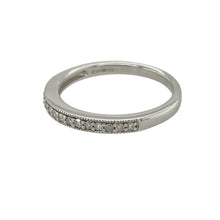 Load image into Gallery viewer, Add refined sparkle and modern elegance to your collection with this pre-owned 9ct white gold and diamond set band ring—sleek, understated, and perfect for stacking or wearing alone.

Design: The band features a row of shimmering diamonds across the 2mm wide front, offering subtle brilliance in a slim, contemporary profile.
Material: Made from 9-carat white gold, the polished finish enhances the clean lines and provides a bright, sophisticated shine.

