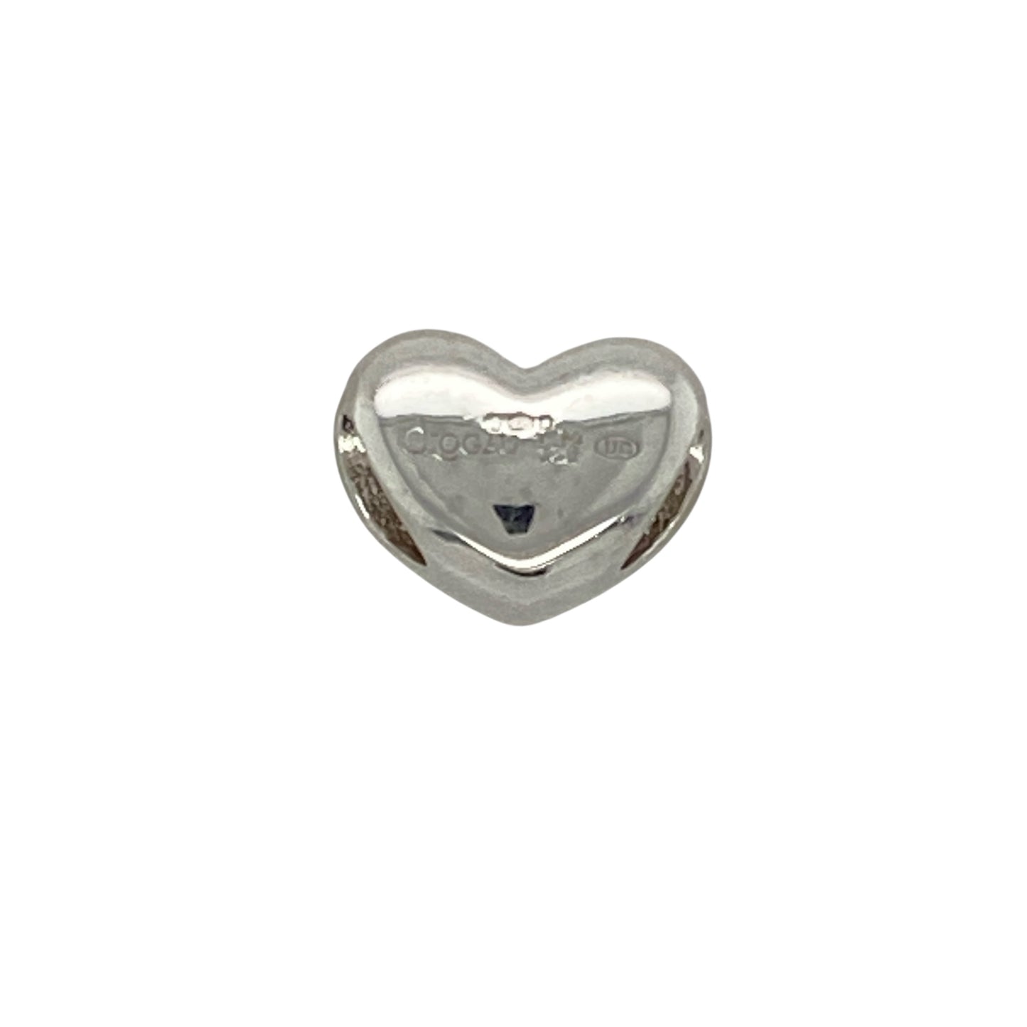 Add a bright and cheerful touch to your collection with this pre-owned Clogau heart charm—featuring vibrant enamel and signature detailing for a playful yet meaningful accent.

Design: The charm features a classic heart shape with a yellow enamel background and the word Clogau elegantly written across the front, creating a bold and eye-catching design.
Material: Made from 925 sterling silver, the polished finish contrasts beautifully with the glossy enamel, enhancing the charm’s colourful appeal.
